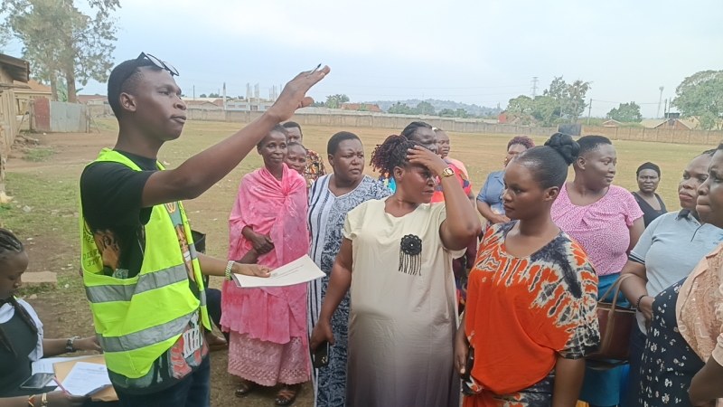 One of the EC officials trying to calm down the voters